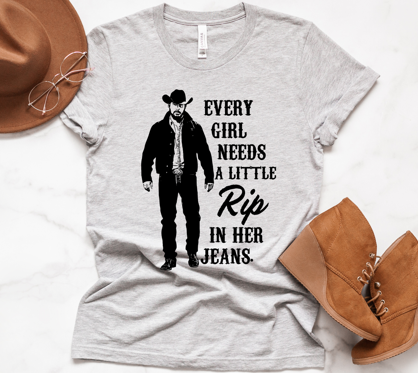 Every Girl Needs A Little Rip In Her Jeans Tee